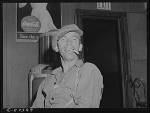 Farm worker in beer parlor on Sunday afternoon. Bruce Crossing, Michigan. 1941.